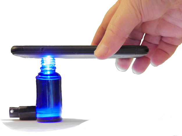 Treat the water with the LIFE App Hold the flashlight over the opening of the bottle